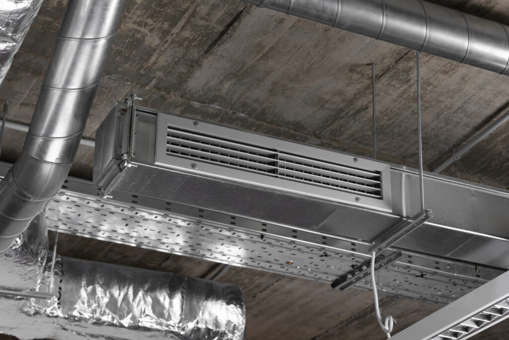 Close-up of commercial ventilation system during professional air duct cleaning in St Peters MO